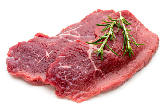 Fresh raw beef steak isolated on white.