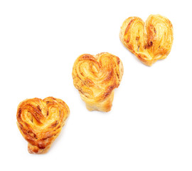 Buns with raisins and jam on a white background