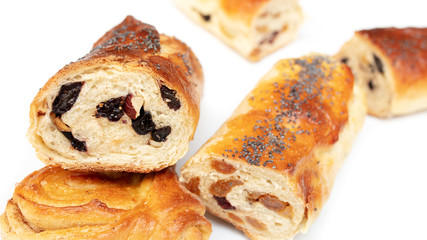 Buns with raisins and jam on a white background