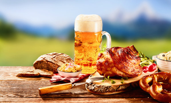 Traditional German set of food with glass of beer