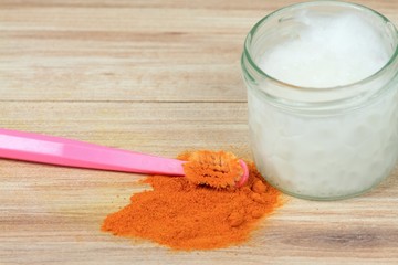 Alternative natural toothpaste, curcuma powder, coconut oil & toothbrush