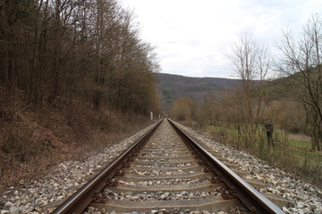Fototapeta na wymiar Railway tracks near Castle of Countess Elisabeth Báthory, Čachtice, Slovakia