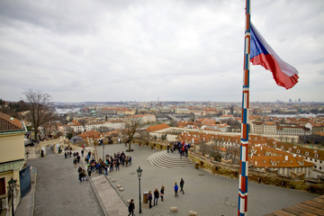 view to observation desk to main square in front of Hradcany Castle with tourists