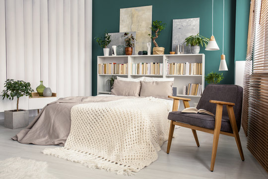 White and green bedroom interior