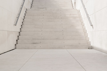 White stairs in an urban street background. No pople backdrop and sun light.