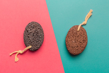 Cosmetic pumice on a bright  bicolor background, top view - obrazy, fototapety, plakaty