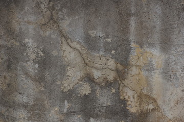 beautiful dirty wall of stucco somewhere fell off a pit of chipped fractures texture background