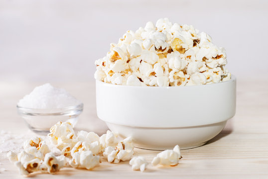 salted popcorn in a white bowl