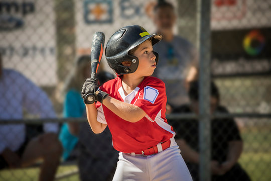 Boy playing baseball