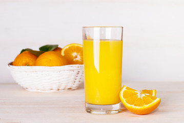 glass of orange juice on a table