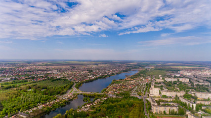 Fototapeta na wymiar Beautiful scenery on the lake and city. Aerial view.