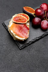Bruschetta with ham, blue ceese and fresh figs