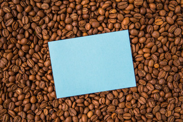 Coffee beans and empty paper top view