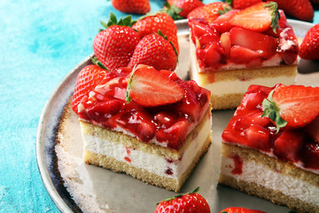 strawberry cake with fresh strawberries and whipped cream.