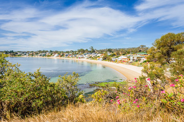 Pretty little to village town view with great paradise sandy beach with turquoise blue water and...