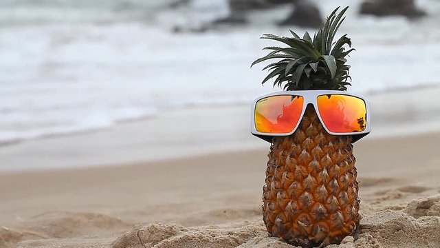 Cheerful pineapple on vacation