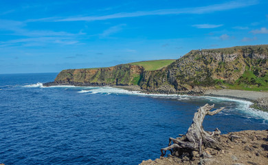 Fototapeta na wymiar Terceira Island, Azores, Portugal - May 5, 2016: View of a bay and small beach on the island of Terceira