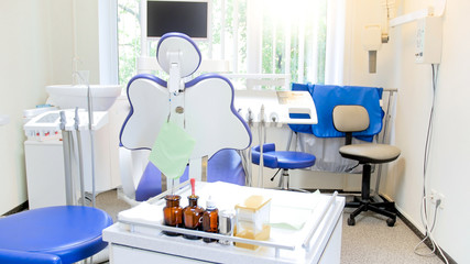 Interior of empty dentist office in bright sunny day