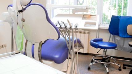Special medical instruments and drills in empty modern dental office
