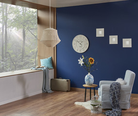 living room dark blue wall and forest view home decoration. Modern apartment style.