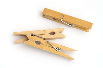 wooden clothespins on white background