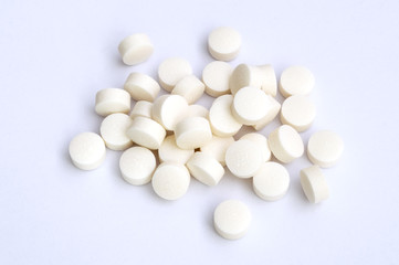 Fototapeta na wymiar group of white medicinal pastilles