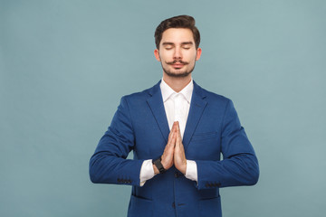 Relaxation and harmony. Man meditating after work