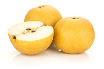 Two Chinese golden pears and one sliced half Nashi variety isolated on white background.