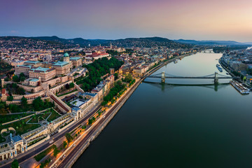 Budapest, Hungary - Panoramic aerial view of Budapest. This view includes Buda Castle Royal Palace, Matthias Churcs, Fisherman's Bastion and Szechenyi Chain Bridge at sunset with colorful sky