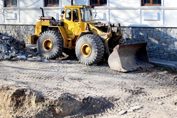 Fototapeta premium Large yellow excavator