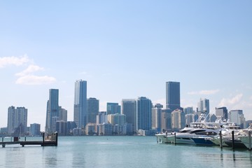 Fototapeta na wymiar Yachts on the Harbor at Key Biscayne Next to the Rickenbacher Causeway Overlooking the City of Miami