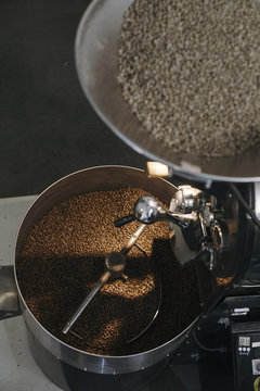 Fresh Coffee Beans Roasting in Industrial Machine Drum for Fresh Brew Production