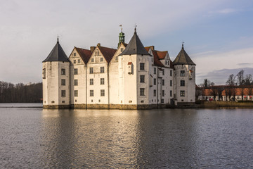 Fototapeta na wymiar Famous german water castle Gluecksburg in northern Germany (in german language 