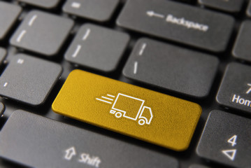 Fast delivery truck service concept on laptop key - 202376985