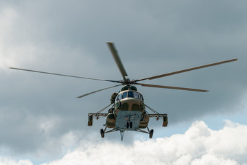 Fototapeta na wymiar Russian military helicopter MI-8 with mines