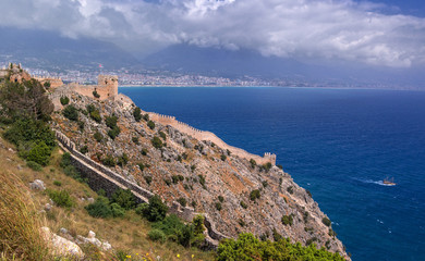 Fototapeta na wymiar The fortress of Alanya in Turkey. Sea view from the fortress wall and watchtower.