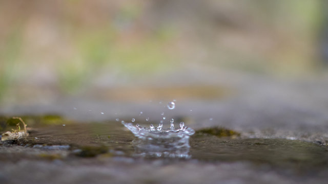 A splash of water hitting the ground