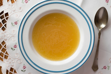 Chicken bone broth served in a plate