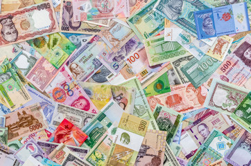 Obraz na płótnie Canvas Background from collection of all world money banknotes