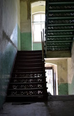 Old staircase in a tenement house - obrazy, fototapety, plakaty