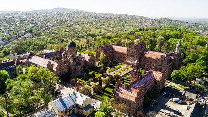 Fototapeta premium CHERNIVTSI, UKRAINE - April, 2018: Residence of Bukovinian and Dalmatian Metropolitans. Chernivtsi National University from above aerial view. Chernivtsi touristic destination of Ukraine.