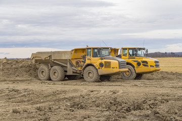 dump trucks at a construction site