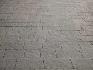 Gray wet concrete pavement