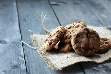 Chocolate cookies on wooden table. Chocolate chip cookies
