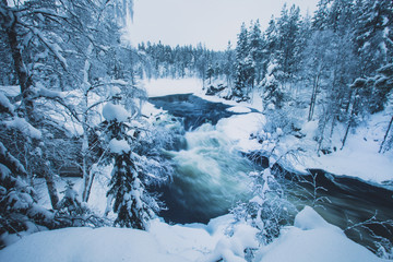 Winter snowy view of Oulanka National Park landscape, a finnish national park in the Northern Ostrobothnia and Lapland regions of Finland
