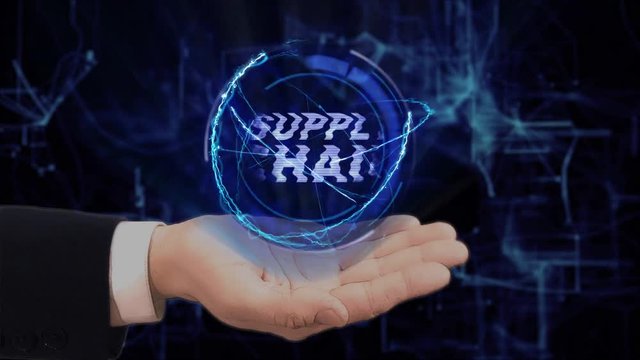Painted hand shows concept hologram Supply Chain on his hand. Drawn man in business suit with future technology screen and modern cosmic background