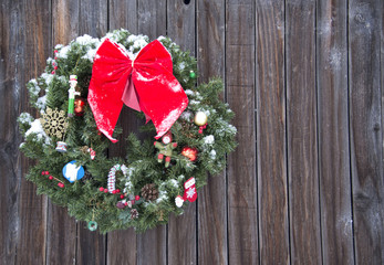 Old Fashioned Christmas Wreath western style on old wood 