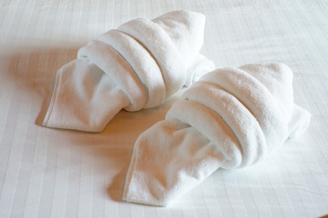 white towels on bed