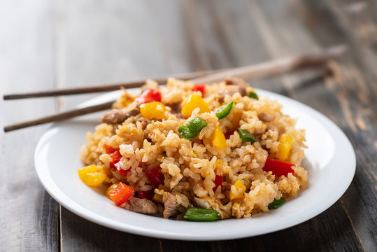 Fried rice with vegetables and pork, Asian cuisine