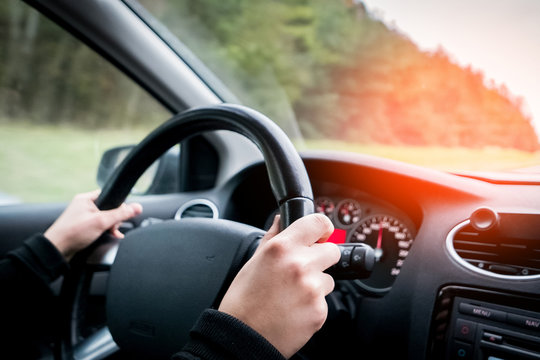 Young woman driving on motorway